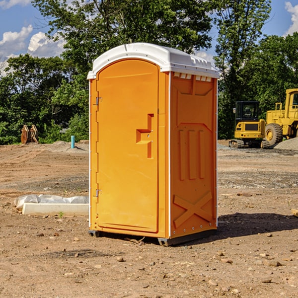 what is the cost difference between standard and deluxe portable restroom rentals in Camp County Texas